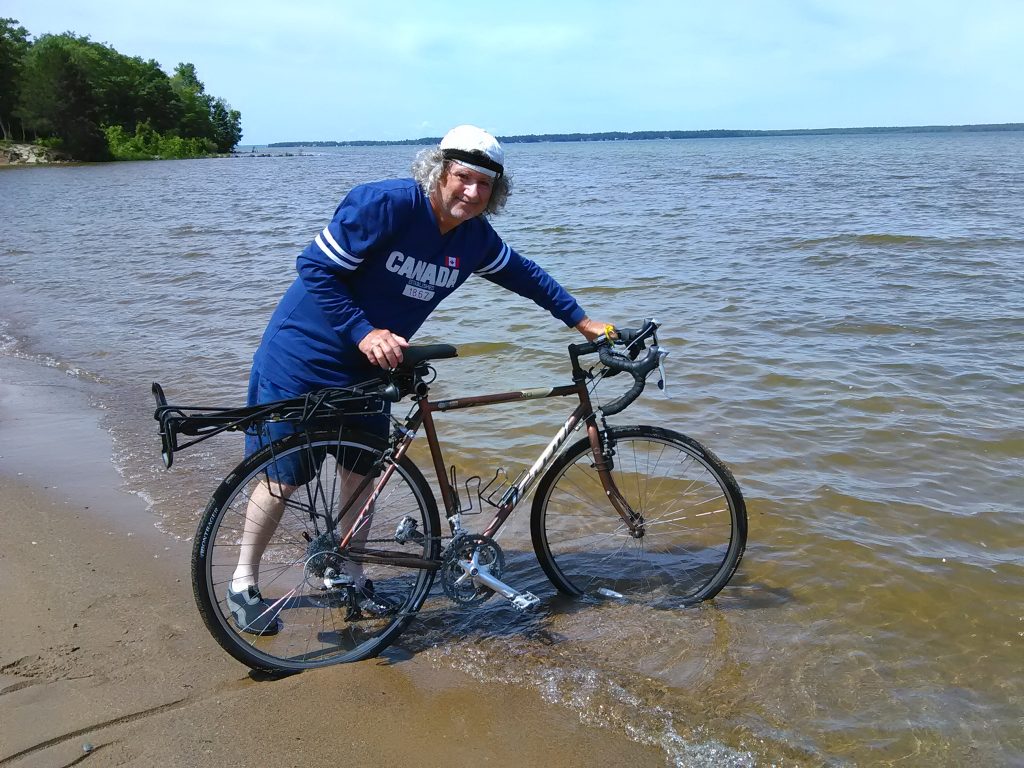 Mack with bicycle in lake